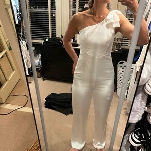 Lulus white satin jumper. Size medium. Ruffles on the shoulder